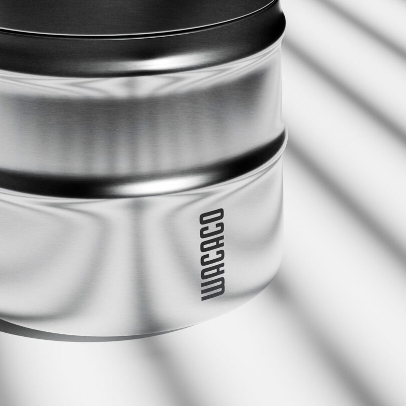A close up of a metal container.