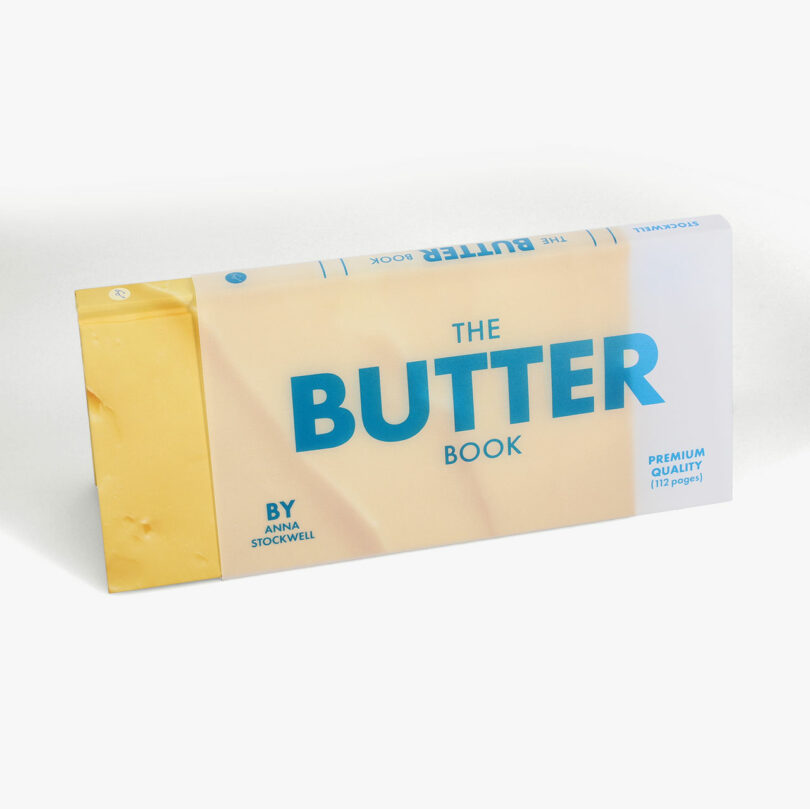A book titled "The Butter Book," authored by Anna Stockwell, features a cover designed to look like a stick of butter and promises to elevate your taste experience.