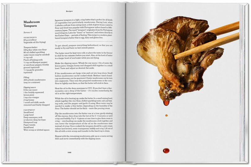 Open cookbook showing a mushroom tempura recipe on the left page and chopsticks holding a tempura mushroom dripping sauce on the right, capturing the irresistible taste of this crispy dish against a white background.