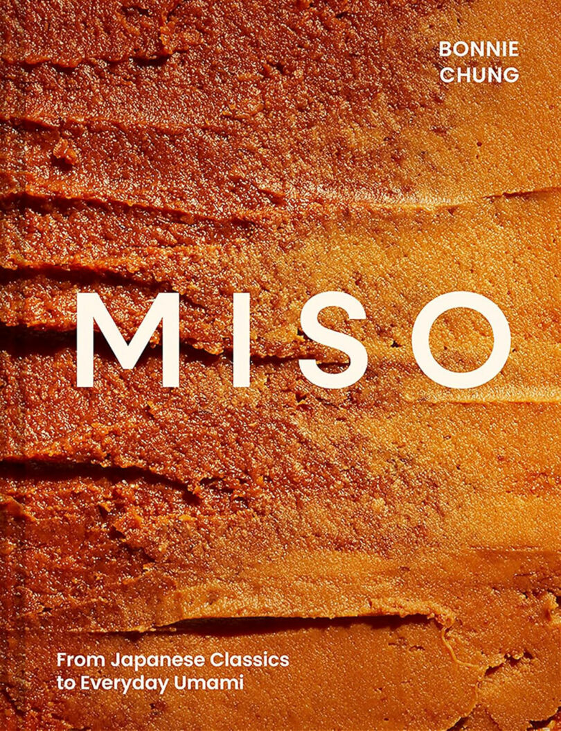Close-up of miso paste with the book title "MISO" and author's name, Bonnie Chung, on the cover. Subtitle reads: "From Japanese Classics to Everyday Umami," highlighting the unique taste of miso in every dish.
