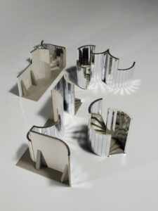 A scale model of a maze made from mirrored partitions